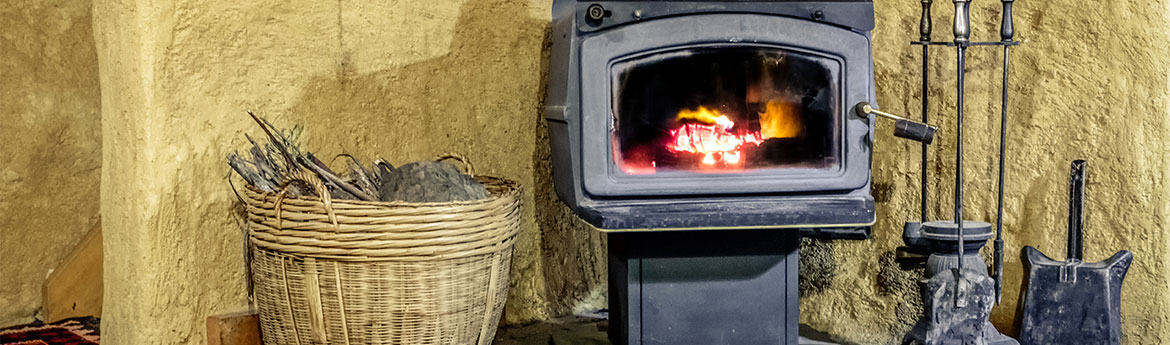 Holzbefeuerter Ofen im Mudbrick Cottage